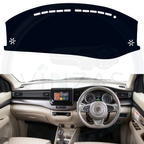 Car dashboard with a black sunshade covering the windshield.