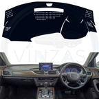 Black custom car dashboard cover installed in an Audi A6