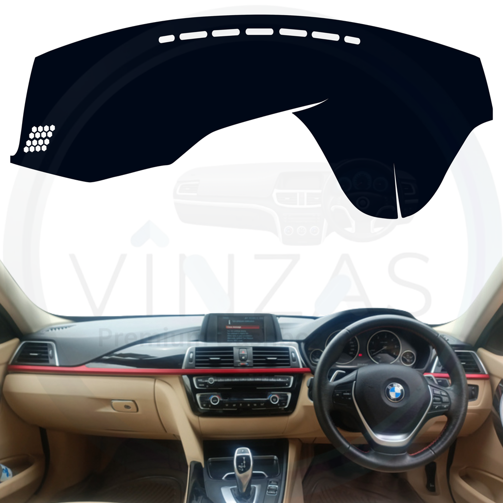 Black custom car dashboard cover installed in a BMW 320 D