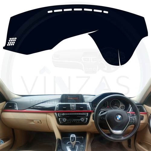 Black custom car dashboard cover installed in a BMW 320 D