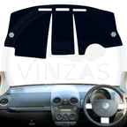 Black custom car dashboard cover installed in a Beetle 
