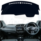 Black custom car dashboard cover installed in a Brio 