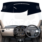 Black custom car dashboard cover installed in an Etios liva
