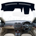 Black custom car dashboard cover installed in a Laura 
