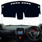 Black custom car dashboard cover installed in a Micra 
