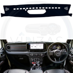 Black custom car dashboard cover installed in a Wrangler 
